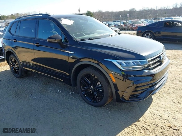 2022 Volkswagen Tiguan SE R-Line Black with VIN 3VVCB7AX1NM084993, listed as a IAAI auction lot 41502738 with 56,559 mi miles. Bid and sale history available at carsss.com. Image 1.
