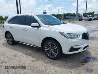 2020 Acura MDX Technology with VIN 5J8YD3H56LL004972, listed as a IAAI auction lot 42671823 with 60,763 mi miles and . Bid and sale history available at DreamBid. Image 1.