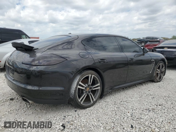2013 Porsche Panamera с VIN WP0AA2A75DL016661, выставлен на аукционе Copart как лот 48977385 с пробегом 55 914 миль миль и Списание • Salvage title. История ставок и продаж доступна на DreamBid. Изображение 3.