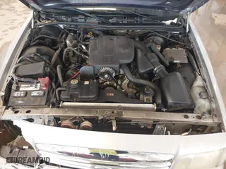 2005 Ford Crown Victoria LX with VIN 2FAFP74W95X158705, listed as a IAAI auction lot 41593553 with 276,940 mi miles. Bid and sale history available at carsss.com. Image 10.