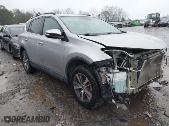 2018 Toyota RAV4 XLE with VIN 2T3RFREV2JW717351, listed as a IAAI auction lot 41576522 with 147,116 mi miles. Bid and sale history available at carsss.com. Image 1.