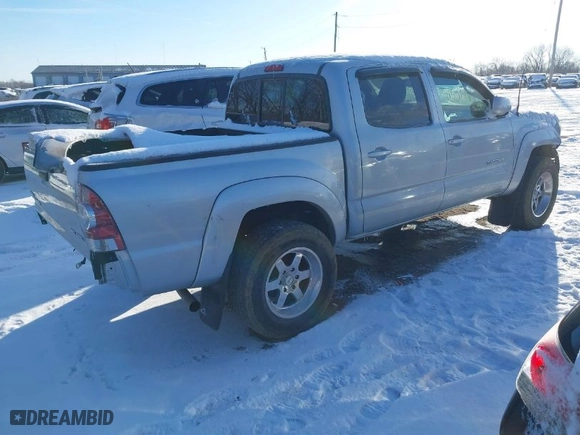2009 Toyota Tacoma with VIN 3TMLU42N59M029232, listed as a IAAI auction lot 41596149 with 143,541 mi miles. Bid and sale history available at carsss.com. Image 4.