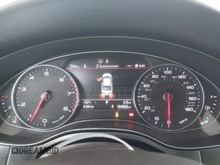 2014 Audi A6 Premium Plus z VIN WAUGFAFC7EN025053, wystawiony jako IAAI lot #42131033 z przebiegiem 154 552 mil mil oraz . Historia ofert i sprzedaży dostępna na DreamBid. Obrazek 7.