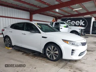 2017 Kia Optima SX with VIN 5XXGW4L2XHG136843, listed as a IAAI auction lot 41806606 with 157,899 mi miles. Bid and sale history available at carsss.com. Image 1.