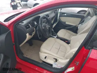 2014 Volkswagen Jetta Sedan SE with VIN 3VWD17AJ4EM293336, listed as a IAAI auction lot 41788438 with 138,128 mi miles. Bid and sale history available at carsss.com. Image 5.