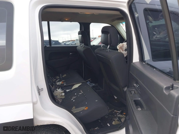 2011 Jeep Liberty Sport with VIN 1J4PP2GK5BW551564, listed as a IAAI auction lot 41126868 with 127,074 mi miles. Bid and sale history available at carsss.com. Image 8.