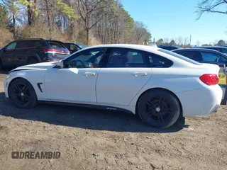 2015 BMW 4 Series 428i xDrive with VIN WBA4C9C51FD331298, listed as a IAAI auction lot 41892173 with 120,484 mi miles and . Bid and sale history available at DreamBid. Image 14.