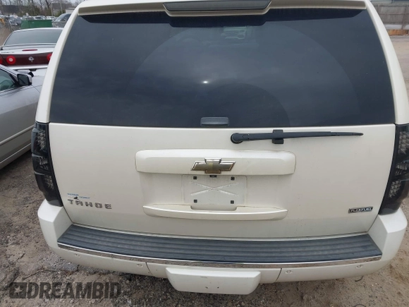 2009 Chevrolet Tahoe LTZ z VIN 1GNFK33089R218771, wystawiony jako IAAI lot #41789581 z przebiegiem 209 247 mil mil oraz . Historia ofert i sprzedaży dostępna na DreamBid. Obrazek 17.