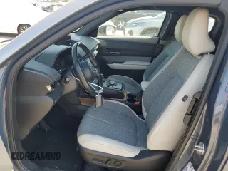 2022 Mazda MX-30 Premium Plus Package with VIN JM1DRADB1N0100639, listed as a Copart auction lot 71770904 with 23,452 mi miles and Salvage Title. Bid and sale history available at carsss.com. Image 7.