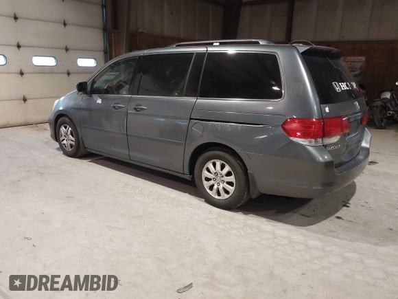 2010 Honda Odyssey EX-L with VIN 5FNRL3H78AB030111, listed as a IAAI auction lot 41250121 with 333,030 mi miles and . Bid and sale history available at DreamBid. Image 3.