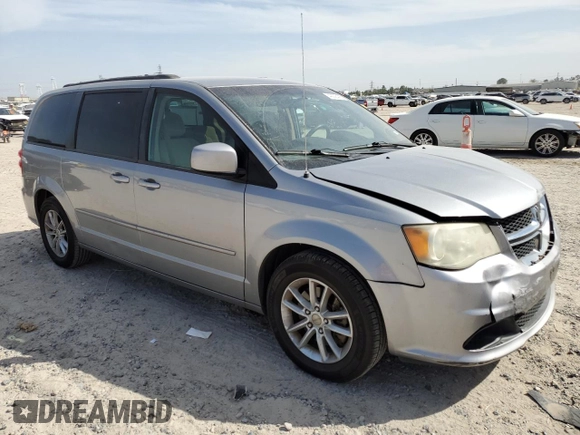 2014 Dodge Grand Caravan SXT with VIN 2C4RDGCG2ER273533, listed as a Copart auction lot 49228495 with 124,070 mi miles and Salvage Title. Bid and sale history available at DreamBid. Image 4.