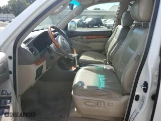 2004 Lexus GX 470 with VIN JTJBT20X340067025, listed as a Copart auction lot 74555384 with 95,321 mi miles and Salvage Title. Bid and sale history available at carsss.com. Image 7.