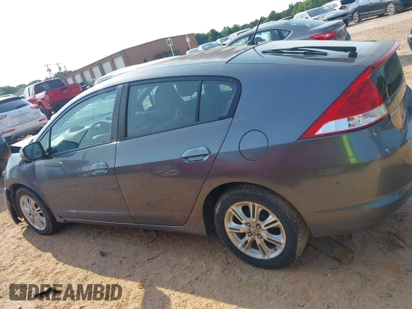 2010 Honda Insight EX with VIN JHMZE2H74AS027020, listed as a IAAI auction lot 42394875 with 248,003 mi miles and . Bid and sale history available at DreamBid. Image 14.