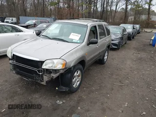 2001 Mazda Tribute LX with VIN 4F2YU08121KM45088, listed as a IAAI auction lot 41693962 with 136,121 mi miles and . Bid and sale history available at DreamBid. Image 2.