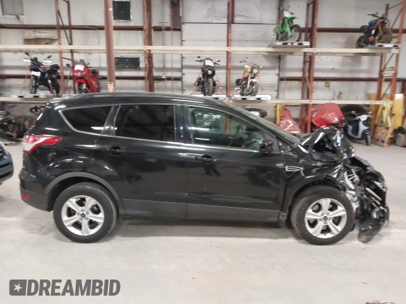 2015 Ford Escape SE with VIN 1FMCU9G97FUA21287, listed as a IAAI auction lot 41990144 with 55,036 mi miles and . Bid and sale history available at DreamBid. Image 14.