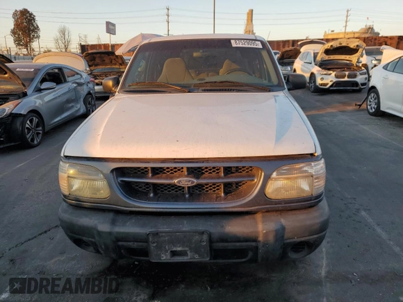 1999 Ford Explorer Sport с VIN 1FMYU22X1XUA31138, выставлен на аукционе Copart как лот 87529095 с пробегом 60 805 миль миль и Чистый • Clean title. История ставок и продаж доступна на DreamBid. Изображение 5.