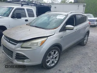 2015 Ford Escape Titanium with VIN 1FMCU0J98FUA87044, listed as a IAAI auction lot 41952096 with 257,437 mi miles. Bid and sale history available at carsss.com. Image 14.