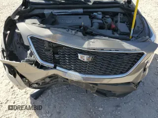 2020 Cadillac XT4 FWD Sport z VIN 1GYFZER40LF134537, wystawiony jako Copart lot #48219045 z przebiegiem 77 307 mil mil oraz Szkoda całkowita • Salvage title. Historia ofert i sprzedaży dostępna na DreamBid. Obrazek 13.