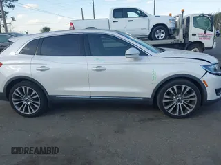 2018 Lincoln MKX Reserve with VIN 2LMPJ6LRXJBL20354, listed as a IAAI auction lot 41561022 with 138,688 mi miles. Bid and sale history available at carsss.com. Image 13.