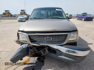 2001 Ford F-150 XLT z VIN 1FTRW07L01KB30498, wystawiony jako Copart lot #57157585 z przebiegiem 343 041 mil mil oraz Szkoda całkowita • Salvage title. Historia ofert i sprzedaży dostępna na DreamBid. Obrazek 5.