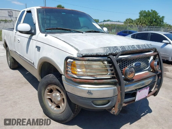 1999 Ford F-150 XL with VIN 2FTRX18L8XCB22793, listed as a IAAI auction lot 42016740 with 198,056 mi miles. Bid and sale history available at carsss.com. Image 1.