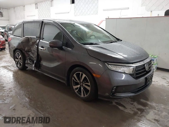 2021 Honda Odyssey Touring with VIN 5FNRL6H86MB026038, listed as a IAAI auction lot 41735249 with 68,480 mi miles. Bid and sale history available at carsss.com. Image 1.