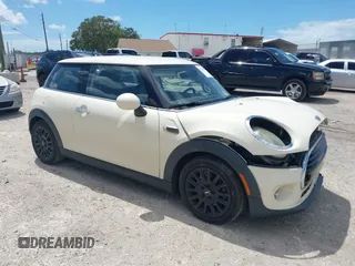 2018 MINI Hardtop Cooper with VIN WMWXP5C58J3C65621, listed as a IAAI auction lot 42259610 with 78,897 mi miles and . Bid and sale history available at DreamBid. Image 1.