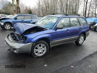 2004 Subaru Forester XS with VIN JF1SG656X4H736820, listed as a Copart auction lot 86334444 with 85,794 mi miles and Salvage title. Bid and sale history available at DreamBid. Image 1.
