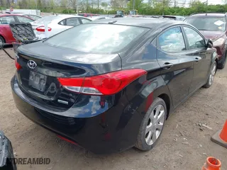 2012 Hyundai Elantra GLS with VIN KMHDH4AE8CU407441, listed as a IAAI auction lot 42125996 with 187,536 mi miles. Bid and sale history available at carsss.com. Image 4.