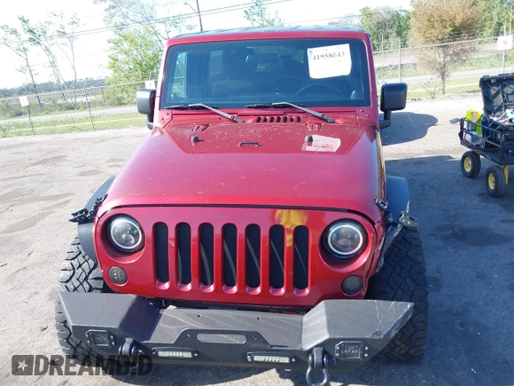 2011 Jeep Wrangler Unlimited Sport with VIN 1J4BA3H18BL598323, listed as a IAAI auction lot 41958043 with 154,354 mi miles. Bid and sale history available at carsss.com. Image 12.
