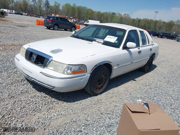 2003 Mercury Grand Marquis LS Premium with VIN 2MEFM75W93X606017, listed as a IAAI auction lot 41899723 with 132,599 mi miles. Bid and sale history available at carsss.com. Image 2.