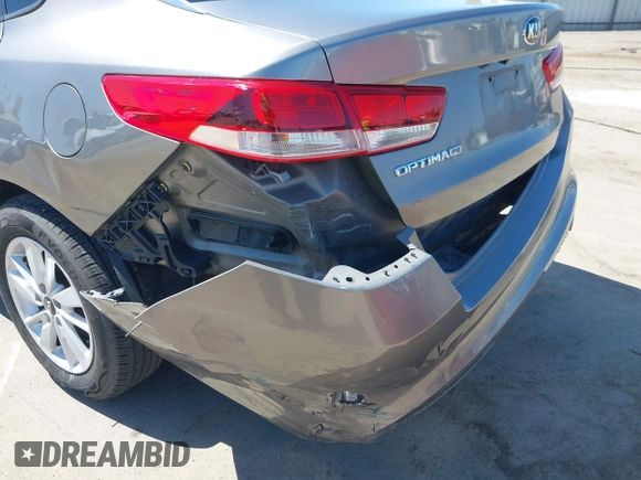 2016 Kia Optima LX with VIN 5XXGT4L36GG098804, listed as a IAAI auction lot 42772231 with 206,471 mi miles and . Bid and sale history available at DreamBid. Image 18.