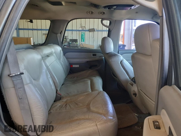 2001 GMC Yukon SLT z VIN 1GKEK13T21J165558, wystawiony jako Copart lot #52200565 z przebiegiem 291 699 mil mil oraz Szkoda całkowita • Salvage title. Historia ofert i sprzedaży dostępna na DreamBid. Obrazek 11.