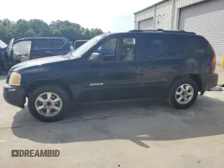 2003 GMC Envoy SLT z VIN 1GKDS13S032252584, wystawiony jako Copart lot #57280285 z przebiegiem 327 986 mil mil oraz Szkoda całkowita • Salvage title. Historia ofert i sprzedaży dostępna na DreamBid. Obrazek 1.
