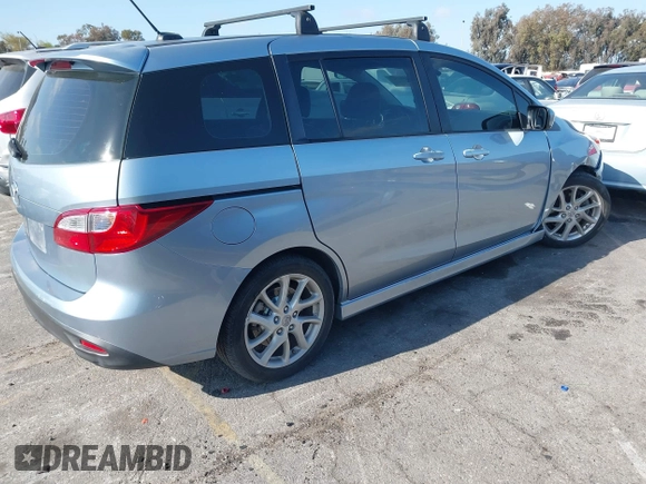 2012 Mazda 5 Grand Touring with VIN JM1CW2DL6C0126640, listed as a IAAI auction lot 42076722 with 124,412 mi miles and . Bid and sale history available at DreamBid. Image 4.
