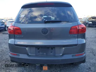 2013 Volkswagen Tiguan with VIN WVGCV3AXXDW611177, listed as a Copart auction lot 82296484 with 95,814 mi miles and Clean Title. Bid and sale history available at DreamBid. Image 6.