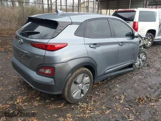 2021 Hyundai Kona Electric Ultimate with VIN KM8K53AG0MU108118, listed as a IAAI auction lot 41247324 with 21,679 mi miles. Bid and sale history available at carsss.com. Image 4.