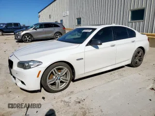 2016 BMW 5 Series 535i xDrive with VIN WBA5B3C59GG252983, listed as a Copart auction lot 52051825 with 110,872 mi miles and Salvage title. Bid and sale history available at DreamBid. Image 1.