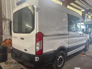 2018 Ford Transit with VIN 1FTYE1CM1JKB31128, listed as a IAAI auction lot 42737735 with 208,336 mi miles and . Bid and sale history available at DreamBid. Image 14.