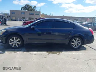 2004 Nissan Maxima SL with VIN 1N4BA41E64C861846, listed as a IAAI auction lot 41911687 with 218,668 mi miles. Bid and sale history available at carsss.com. Image 14.