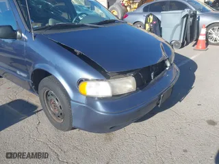 1997 Nissan Quest XE with VIN 4N2DN1118VD850276, listed as a IAAI auction lot 41403441 with 207,530 mi miles. Bid and sale history available at carsss.com. Image 6.