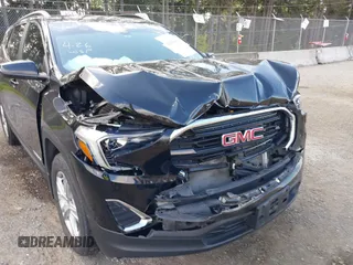 2021 GMC Terrain SLE with VIN 3GKALTEV5ML385795, listed as a IAAI auction lot 42142828 with 40,752 mi miles and . Bid and sale history available at carsss.com. Image 6.