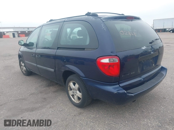 2005 Dodge Caravan SE with VIN 1D4GP24R95B420644, listed as a IAAI auction lot 42302868 with 256,701 mi miles and . Bid and sale history available at DreamBid. Image 3.