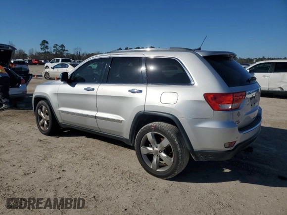 2013 Jeep Grand Cherokee Overland with VIN 1C4RJECG4DC644809, listed as a Copart auction lot 42265005 with 213,493 mi miles and Salvage Title. Bid and sale history available at carsss.com. Image 2.