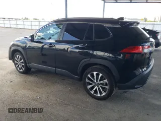 2023 Toyota Corolla Cross XLE z VIN 7MUDAABG6PV048792, wystawiony jako Copart lot #56819095 z przebiegiem 59 189 mil mil oraz Szkoda całkowita • Salvage title. Historia ofert i sprzedaży dostępna na DreamBid. Obrazek 2.