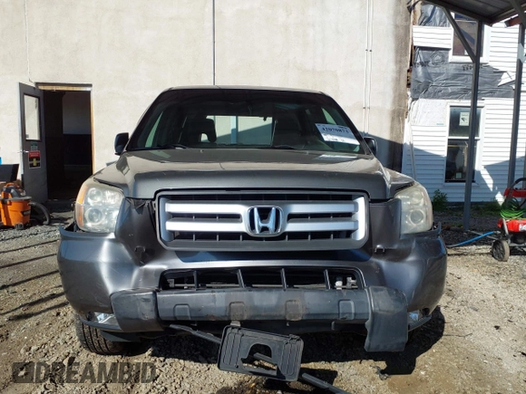 2007 Honda Pilot EX-L with VIN 5FNYF18777B012649, listed as a IAAI auction lot 42070873 with 167,419 mi miles and . Bid and sale history available at DreamBid. Image 12.
