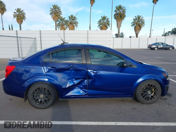 2013 Chevrolet Sonic LT with VIN 1G1JC5SB2D4147595, listed as a IAAI auction lot 41643641 with 83,538 mi miles and . Bid and sale history available at DreamBid. Image 13.