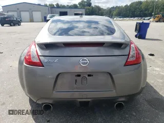 2010 Nissan 370Z Touring with VIN JN1AZ4EH8AM501134, listed as a Copart auction lot 73919614 with 106,599 mi miles and Salvage Title. Bid and sale history available at carsss.com. Image 6.