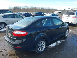 2019 Ford Fiesta SE with VIN 3FADP4BJ8KM137770, listed as a IAAI auction lot 41570607 with 89,160 mi miles. Bid and sale history available at carsss.com. Image 4.