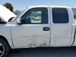 2005 Chevrolet Silverado 1500 Work Truck with VIN 1GCEC19X25Z301634, listed as a Copart auction lot 57970605 with 173,372 mi miles and Salvage title. Bid and sale history available at DreamBid. Image 7.